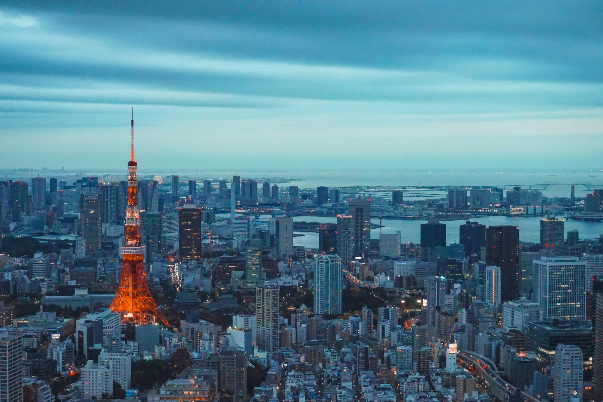 Tokyo skyline at dusk with Tokyo Tower and the bay beyond